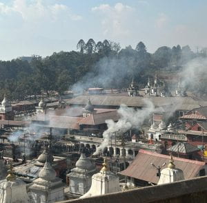 Smoke rising from cremations taking place at the Pashupatinath Temple